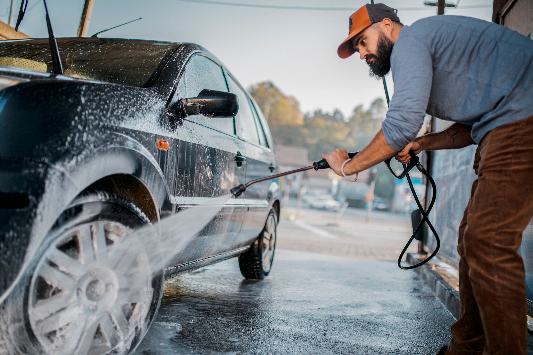 Expert team cleaning a car